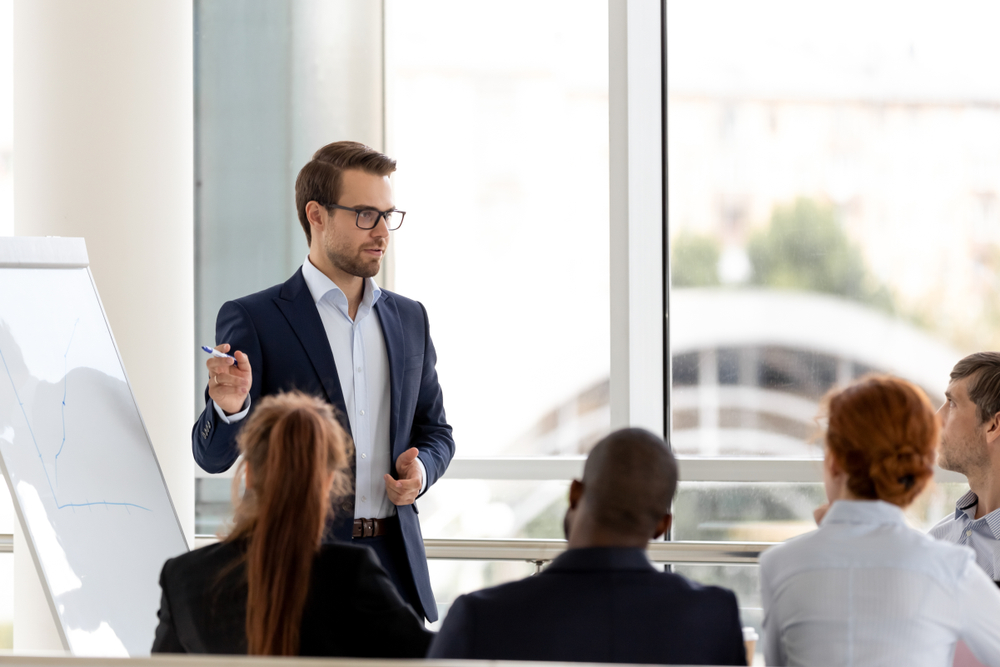 Boss In Suit Presenting New Project Business Plan